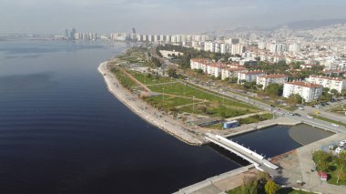 İzmir - Türkiye, 2 Aralık 2024, Bostanli gün batımı teras hava aracı atışı