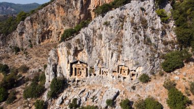 Kaunos Dalyan 'daki kaya kesimli tapınak mezarları - Türkiye (Türkçe adı; kaya mezarları) Antik Dalyan vadisi Kaunos kenti, Türkiye. Kaunos (Latince: Caunus), Anadolu 'da bir şehirdir.