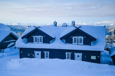 Rauland, Norway - January 14, 2023: Orange electric car MG4 is a hatchback chinese electric car