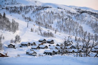 Rauland, Norway - January 14, 2023: Orange electric car MG4 is a hatchback chinese electric car