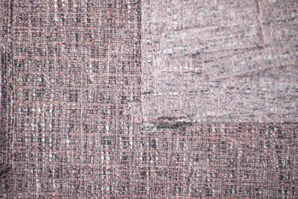 粗い綿のキャンバスおよびトリミングの残骸 衣服の生産からの本物のピンクの重複 — ストック写真