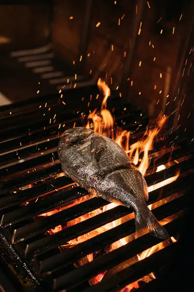 Dorado on Fire Grill, fish barbecue, beautiful fire