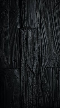 Siyah ahşap kaplama arka plan. Dikey fotoğraf. Üst görünüm.