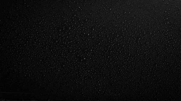 water drops on black background. Macro. Black banner.