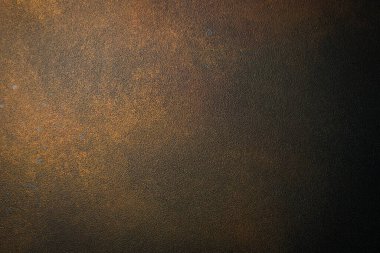 Koyu kahverengi desenli yüzey. Metin için boş alan. Paslı metal arkaplan.