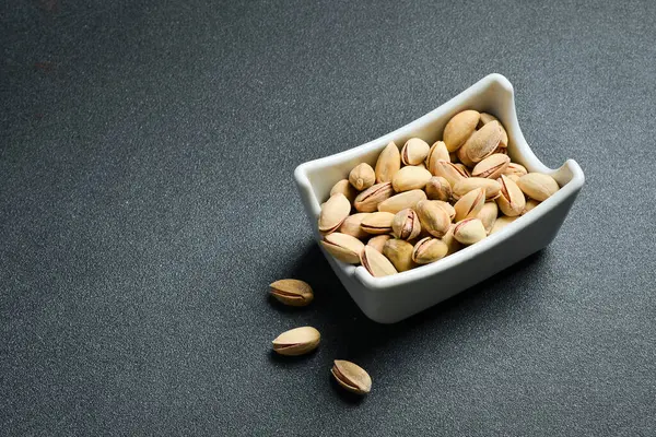 Deniz kabuğunda tuzlu fıstık. Metin için boş alan. Kapat..