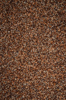 Kahverengi kum arka planı. Desenli kum yüzeyi.