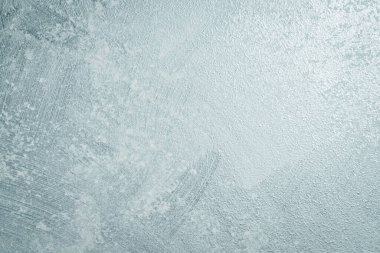 Gümüş renkli parlak taş arka plan. Güzel Soyut Grunge Dekoratif Boyalı Stucco Duvar dokusu. Üst görünüm.