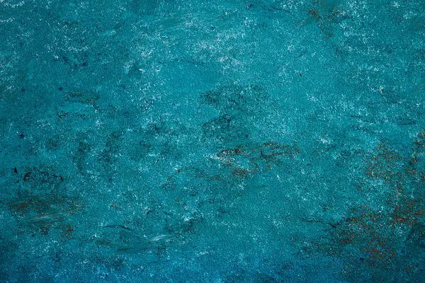 Koyu turkuaz arka planda taş taklidi. Arka planlar için güzel desenli Venedik sıva.