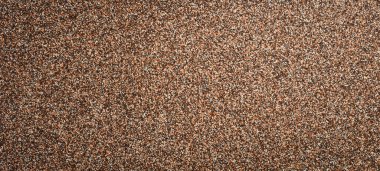 Kahverengi kum arka planı. Desenli kum yüzeyi.