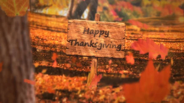 木の看板が付いている幸せな感謝祭の落下葉はすべての周りに落ちる葉のベッドで幸せな感謝祭を言う木の看板を備えています — ストック写真