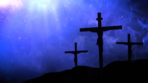 stock image It is Finished Three Crosses features three cross silhouettes with figures on them and a blue atmosphere.