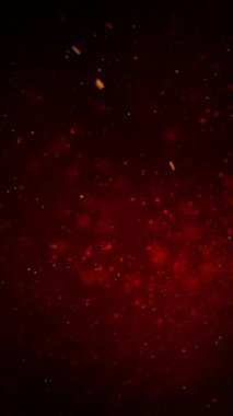 Dikey Kırmızı Parıltı Patlamaları ve Parıltı 4K Döngüsü dikey oran döngüsünde kırmızı eğimli atmosferde dönen parçacıklar ve simler içerir.