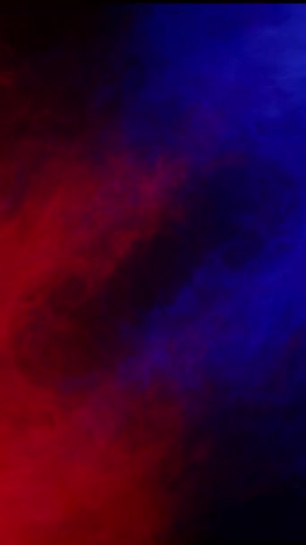 垂直上升和下降的烟雾蓝色红色4K环的特点是 红色烟雾上升 以垂直比循环的方式与黑色背景中的蓝色烟雾相遇 — 图库视频影像