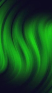 Dikey Yeşil ve Mavi Kıvrımlı Arkaplan Çizgileri 4K Döngüsü dikey bir oranda siyah bir arkaplan üzerinde yeşil girdap veya dönen şekiller içerir.