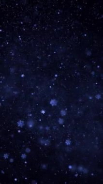 Dikey Mavi Kar yağışı Siyah 4K döngüsüne karşı düşey oran döngüsünde siyah bir atmosferde dönen mavi parıltı ve kar tanelerine sahiptir..