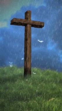 Tepedeki Dikey Haç Fırtına 4K döngüsünde, atmosferde rüzgarın savurduğu yağmur, bulutlar ve karahindiba tohumlarının dikey oran döngüsü ile çimenli bir alanda eski bir ahşap haç bulunur..