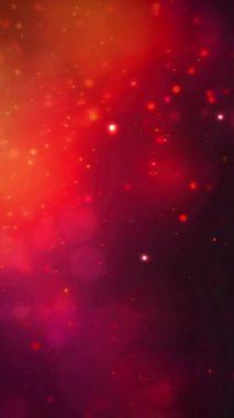Dikey Kırmızı Parçacık Bulutu Yükselen 4K döngüsü dikey oran döngüsünde koyu kırmızı bir atmosferde çok hızlı yüzen ışık ve parçacıkları içerir..