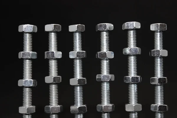 Stahlmuttern Gleichen Abstand Zwischen Auf Einem Langen Gewinde Metallstangen Textur — Stockfoto