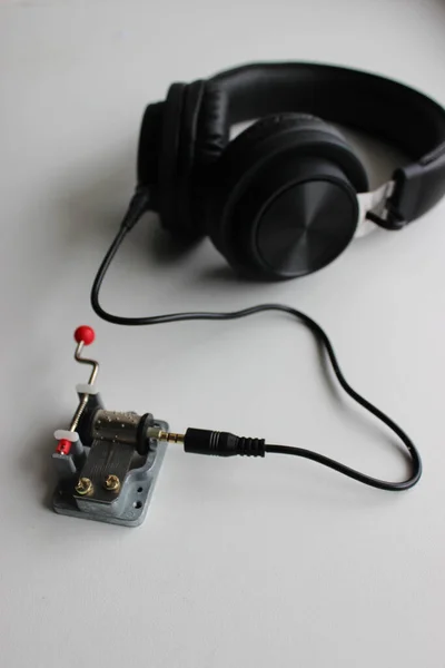 Connection Between Crank Musical Box And Headset Vertical Stock Photo
