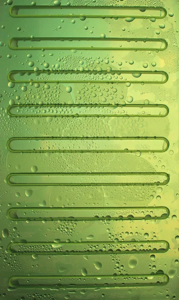 Tropfen Kalten Wassers Auf Einer Grünen Gewellten Oberfläche Archivfoto Für — Stockfoto