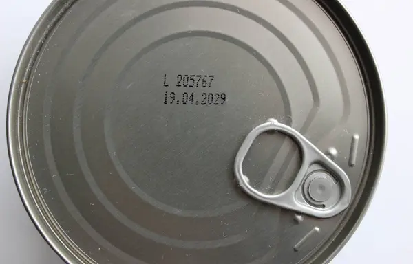 stock image Shelf Stable Goods. Key tin with the date of use until 2029 stamped on the lid