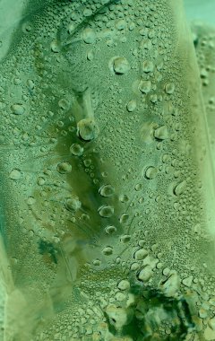 Yeşil sıvı hücrelerle dolu pürüzsüz kıvrımlı yüzey dikey hikaye için görüntü depoluyor