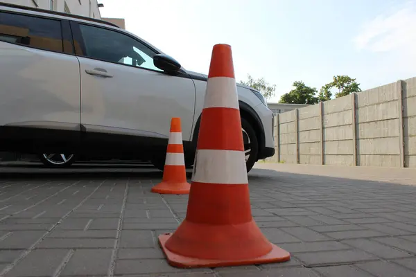 stock image Signal Cones On Vacant Parking Lot. The Sign To Be A Careful On Parking Area 