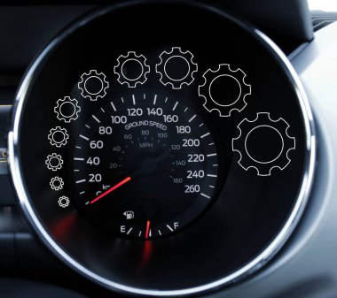 Otomobilin hız ölçer ölçeğinde artan boyutta şeffaf vites hatlarıyla oluşturulmuş eğri çizgi