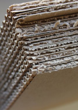 Inner structure of packaging corrugated cardboard sheets stacked tightly