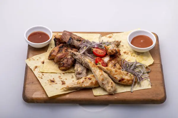kebab on plate on table
