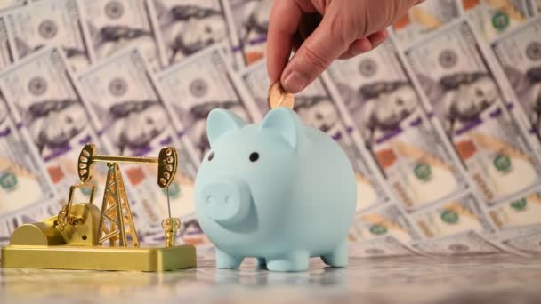 Miniature Gold Oil Pump Background 100 Dollar Bills — Video
