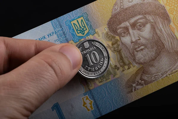 stock image 10 Ukrainian hryvnia coin and 1 Ukrainian hryvnia banknote