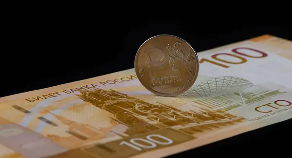 Conceptual story about Russian currency with a 100 Russian ruble bill