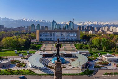 Almaty, Kazakhstan, 04/18/2024. The monument to the independence of Kazakhstan and the akimat (mayor's office) of the city of Almaty clipart