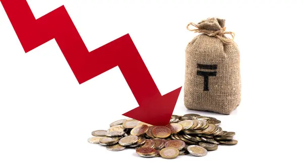 stock image Conceptual story about the exchange rate of the Kazakh currency tenge with a red arrow of a falling graph, 100 and 200 tenge coins and a money bag with a currency symbol on a white background