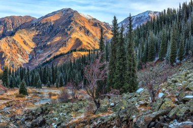 Picturesque autumn views in the Trans-Ili Alatau mountains in the vicinity of the Kazakh city of Almaty after the first frost clipart