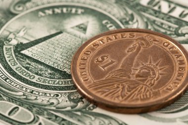 1 dolar ve 1 doların bir parçası.