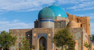 The medieval mausoleum of Khoja Akhmet Yassaui in the Kazakh city of Turkestan - the heart of the Turkic world clipart