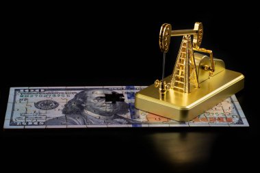 Altın minyatür yağ pompası ve yapboz 100 Amerikan doları.