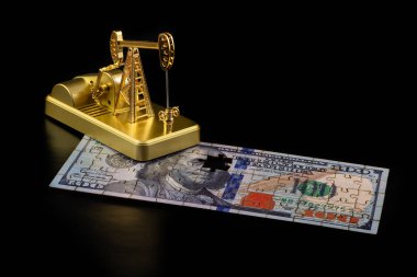 Altın minyatür yağ pompası ve yapboz 100 Amerikan doları.