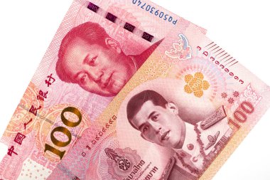 100 Çin Yuanı ve 100 Tayland Bahti banknotları