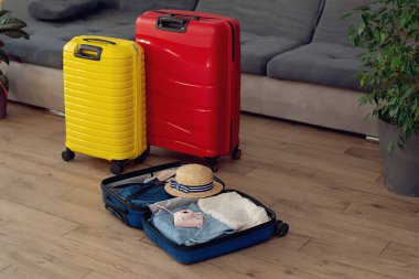 Travel concept . suitcases at home living room. Holiday vacation traveling abroad concept