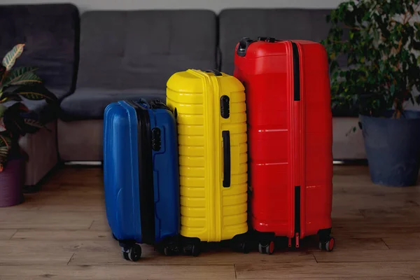 Packed suitcase with belongings on bed. Travel concept