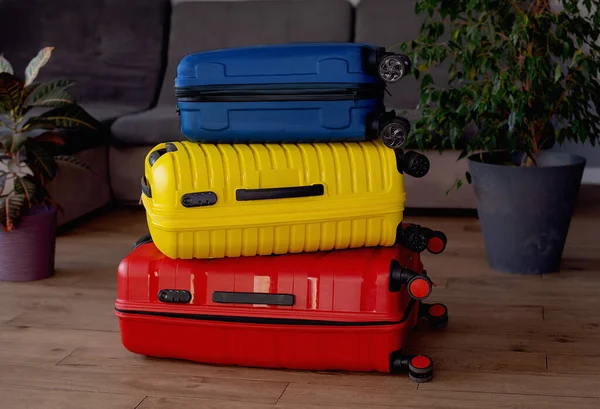 Packed suitcases with belongings on bed. Travel concept