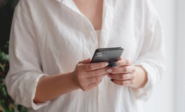 woman hand holding texting using mobile .background empty space for advertise. work people contact marketing business