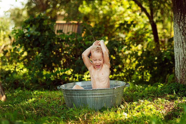 Little Baby Bathes Basin Laughs Splashing His Hands Water Making — Fotografia de Stock