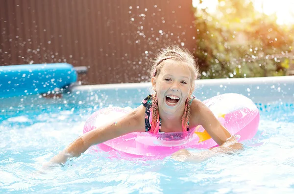Little Girl Sitting Inflatable Ring Swimming Pool Summer Vacations — Fotografia de Stock