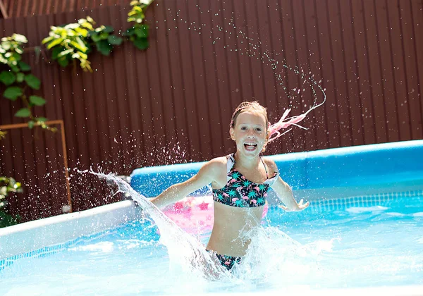 Little Girl Playing Outdoor Swimming Pool Jumping Water Summer Vacation — Fotografia de Stock