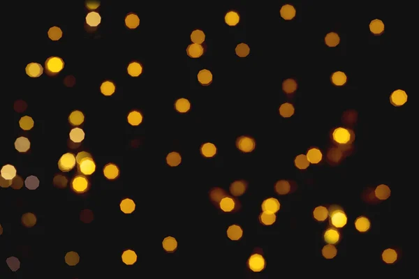 Siyah arkaplandaki bokeh ışıklarının fotoğrafı